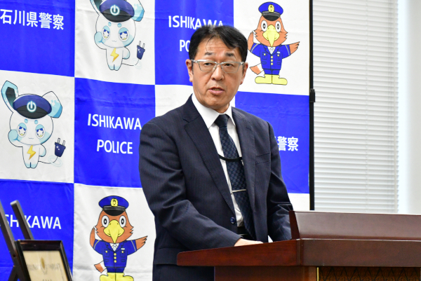 報告会冒頭で挨拶する石川県警察 竹本邦夫生活安全部長 報告会冒頭で挨拶する石川県警察 竹本邦夫生活安全部長